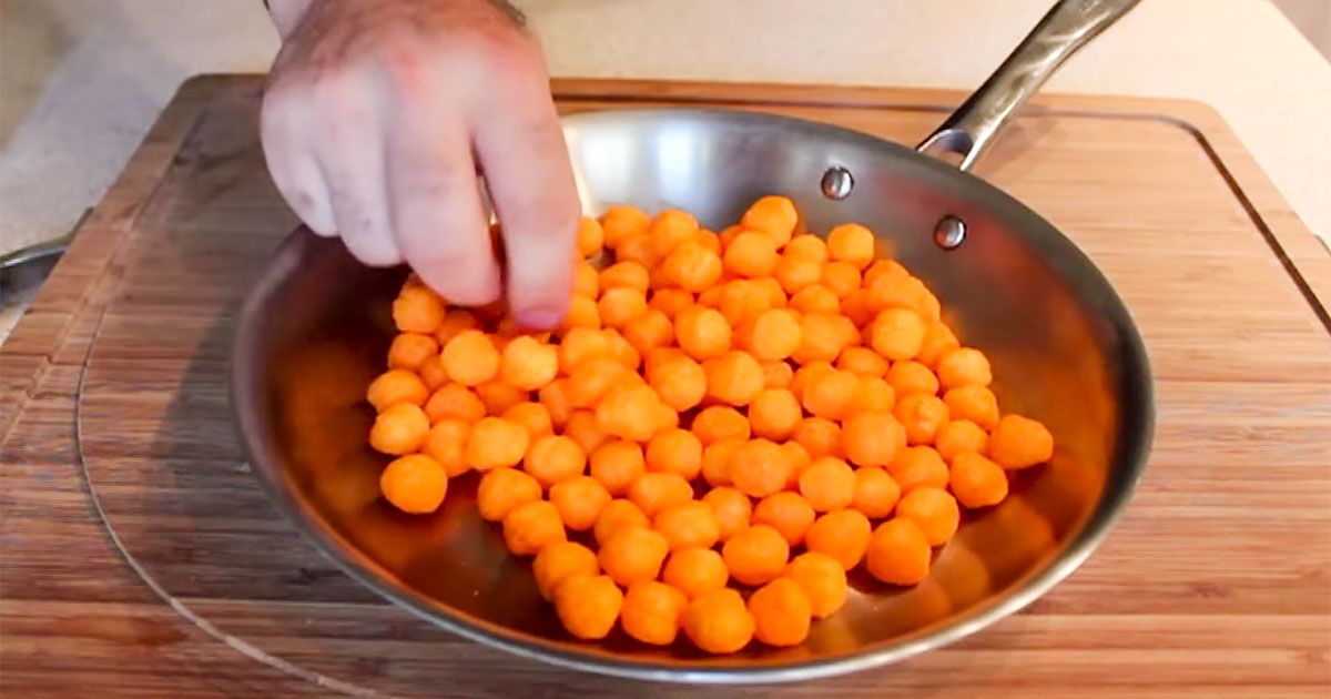 Chef Demonstrates The Proper Method Of Flipping Food SF Globe