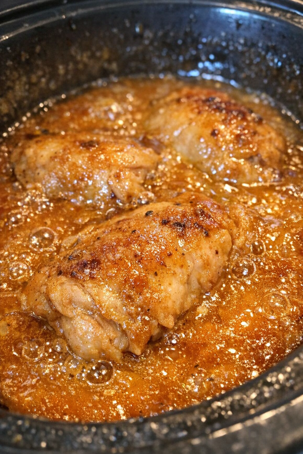 Slow cooker chicken in golden-orange sauce