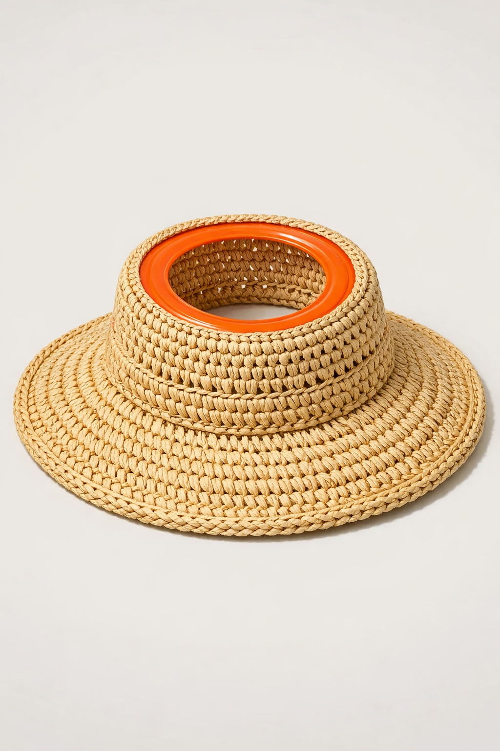 Finished crochet raffia summer sun hat made from an orange frisbee