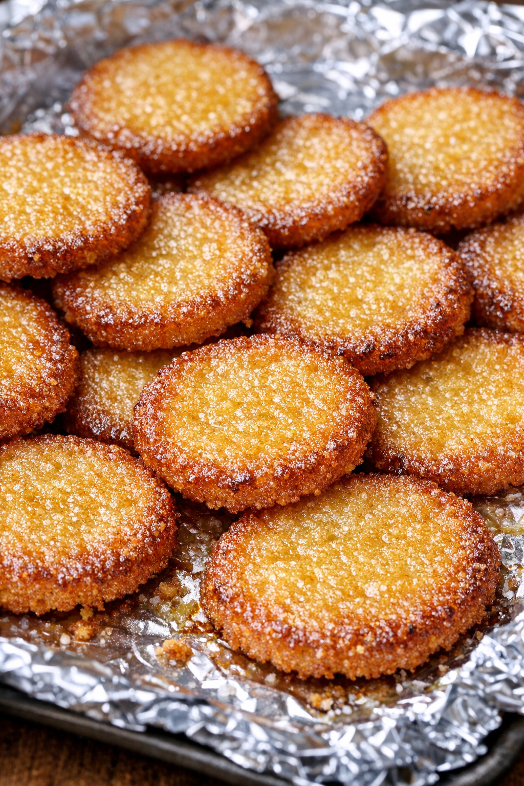 Southern 3-ingredient cornmeal pennies on a foil-lined baking tray