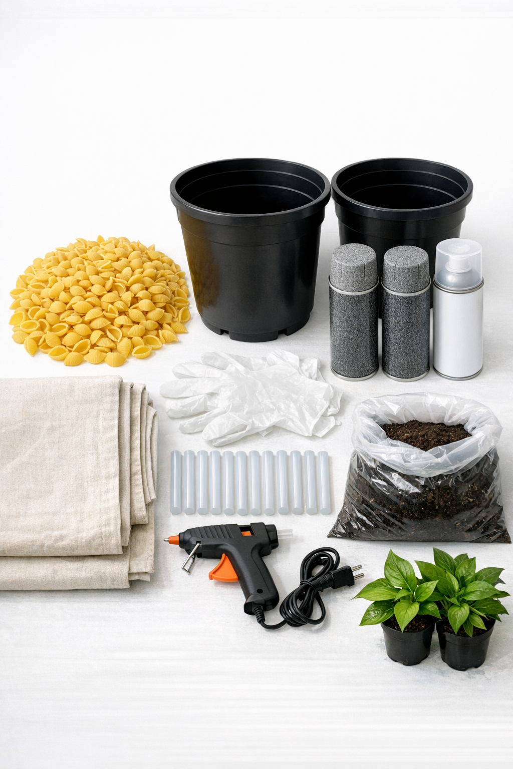 Materials for faux stone mosaic porch planters laid out on a work surface