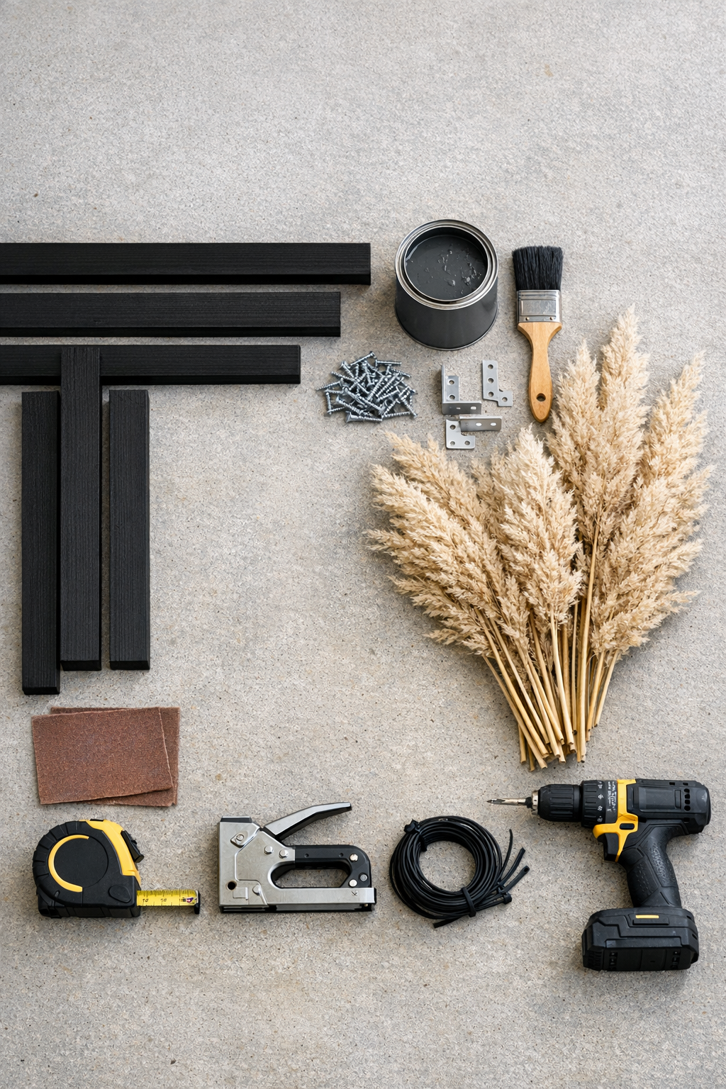 Materials laid out for a woven pampas grass patio privacy screen