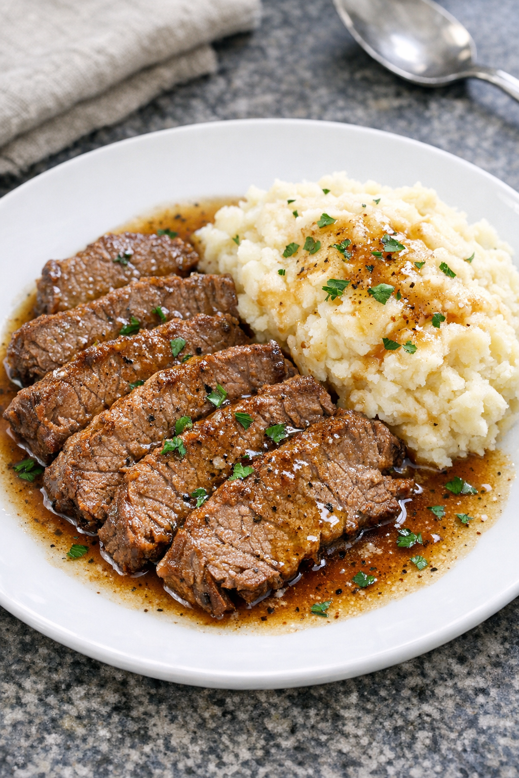 Finished Amish brown butter beef plated with mashed potatoes