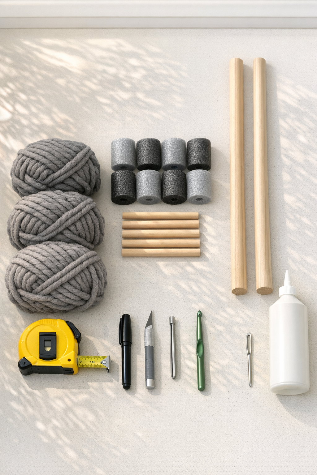 Materials for a crocheted pool noodle blanket ladder laid out on a table
