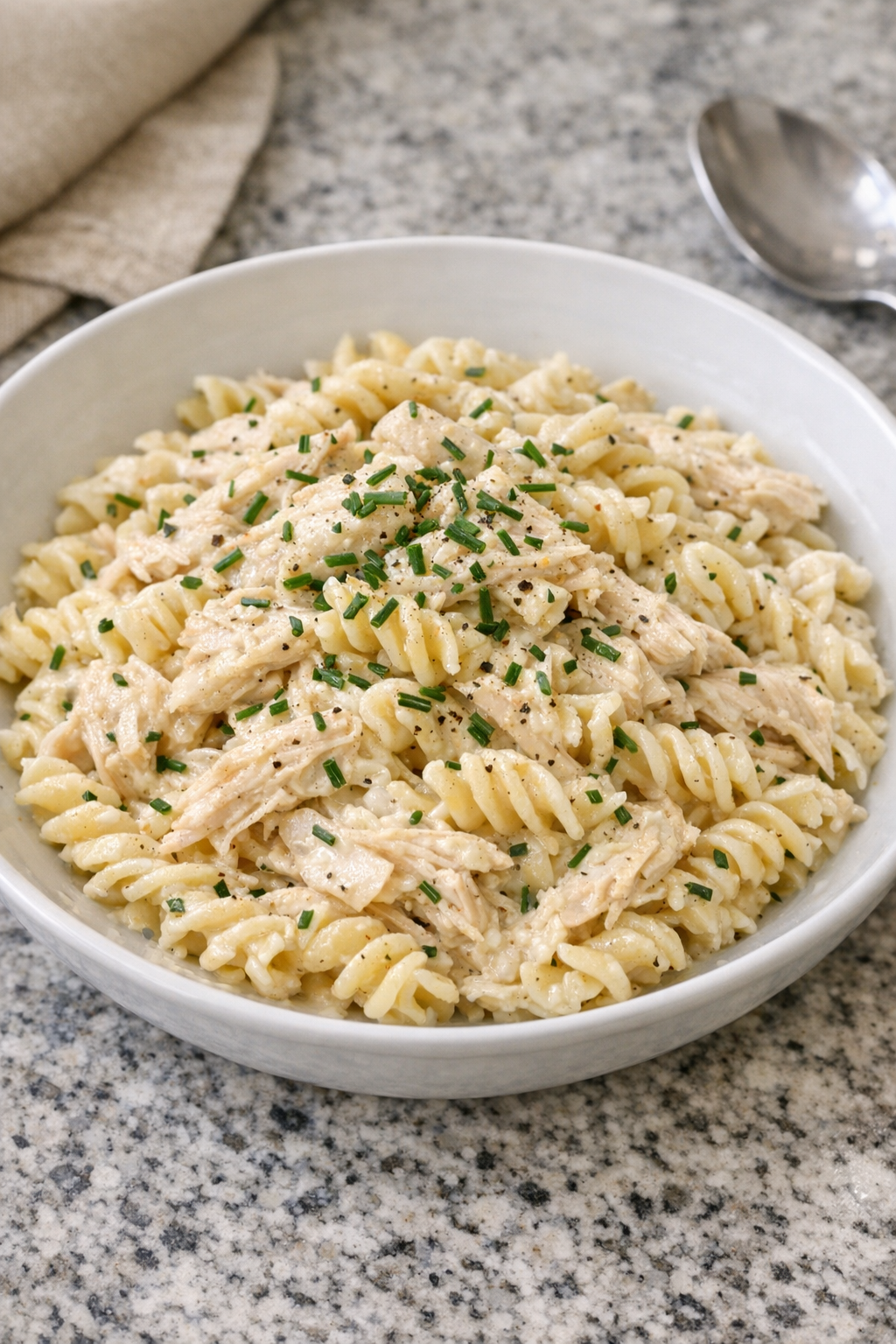 Finished Amish chive turkey pasta plated in a bowl