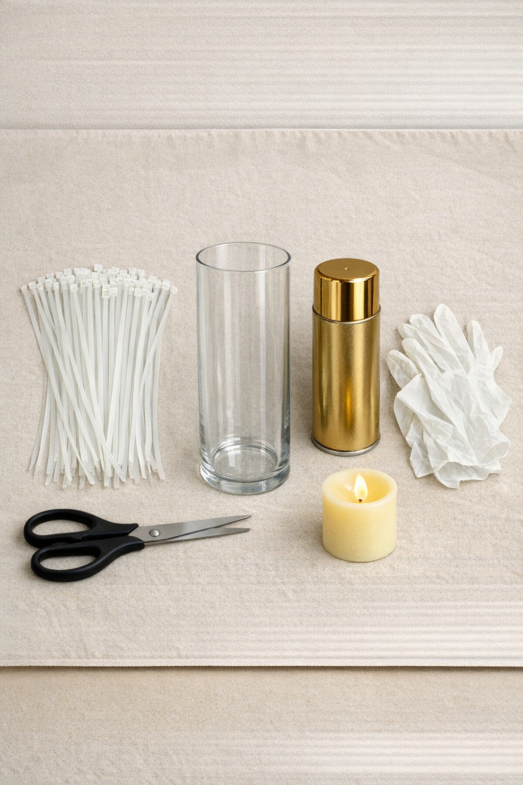 Materials for making a gold zip tie patio lantern laid out neatly