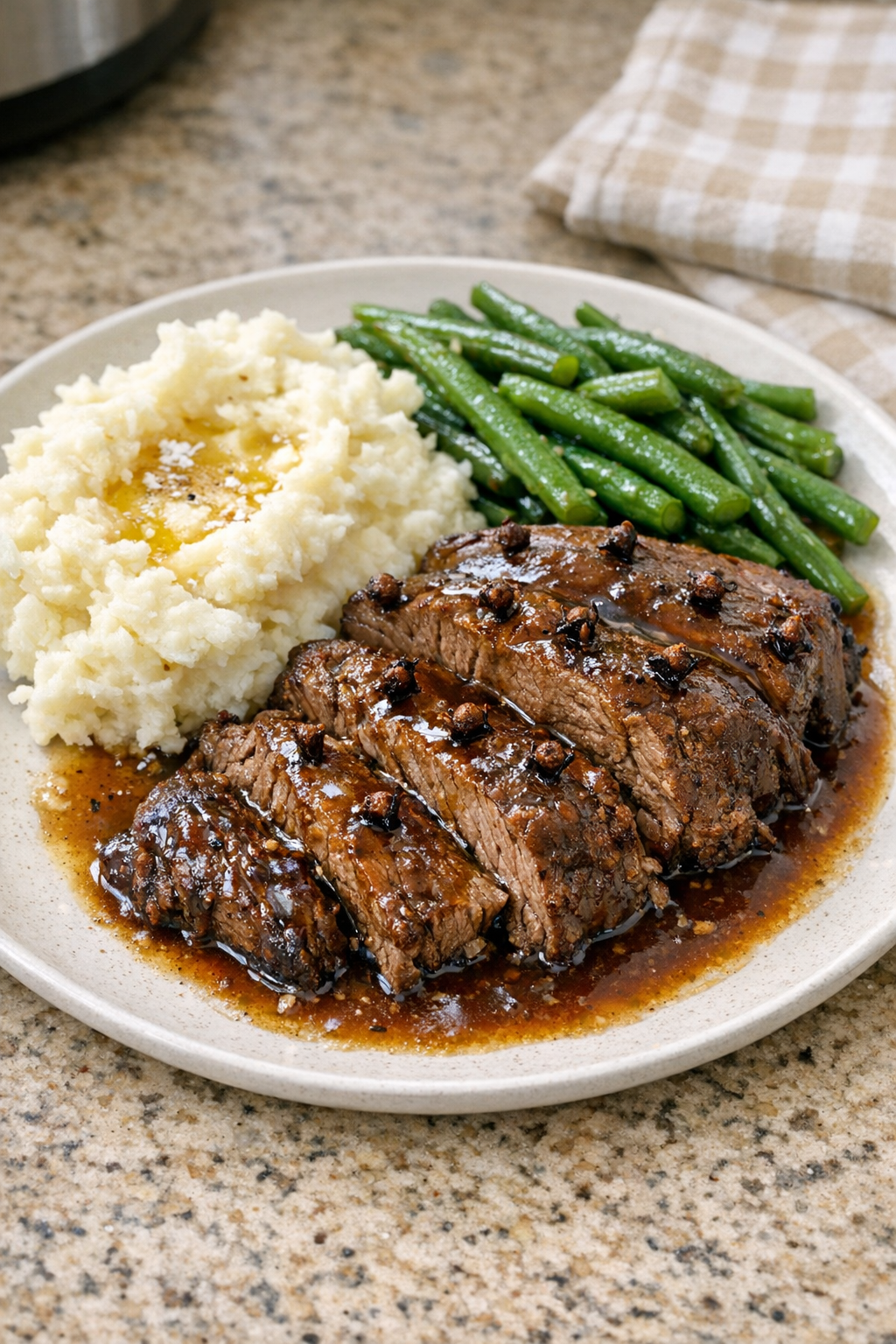 Finished Amish clove beef plated with gravy