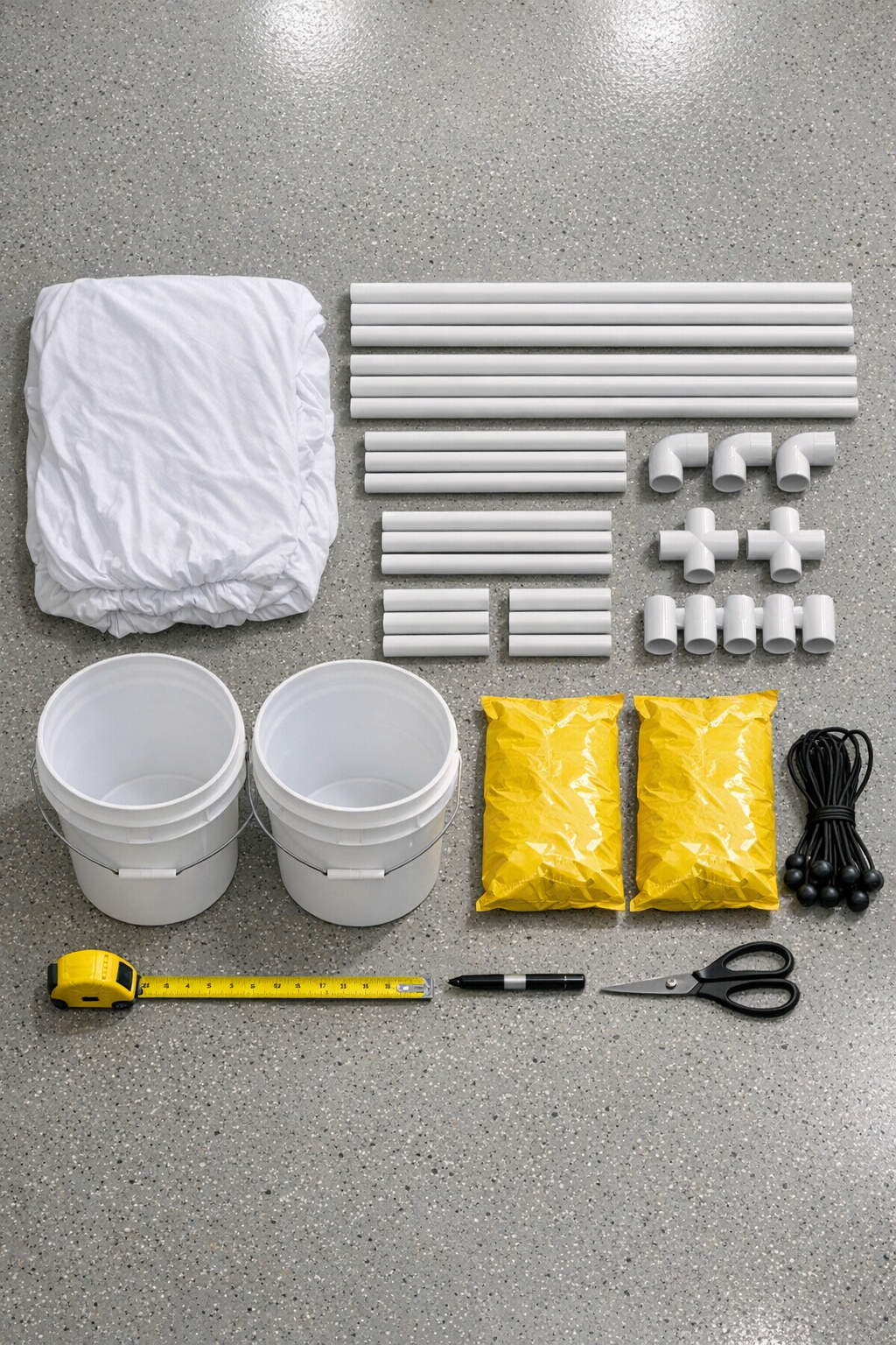 Materials for a PVC outdoor movie screen laid out together