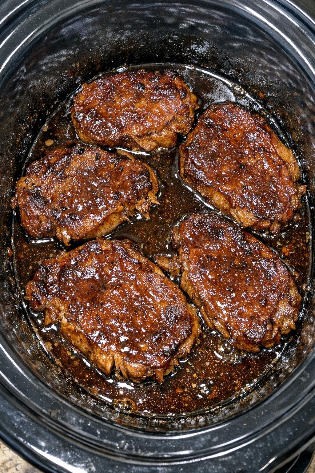Finished root beer pork chops in the slow cooker