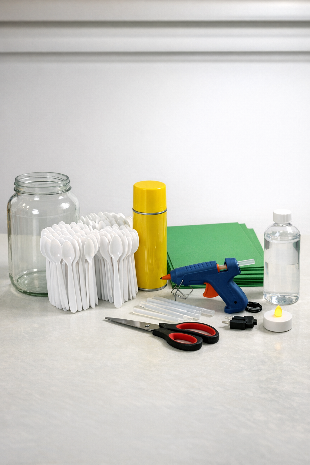 Materials for making a pineapple lantern laid out on a table
