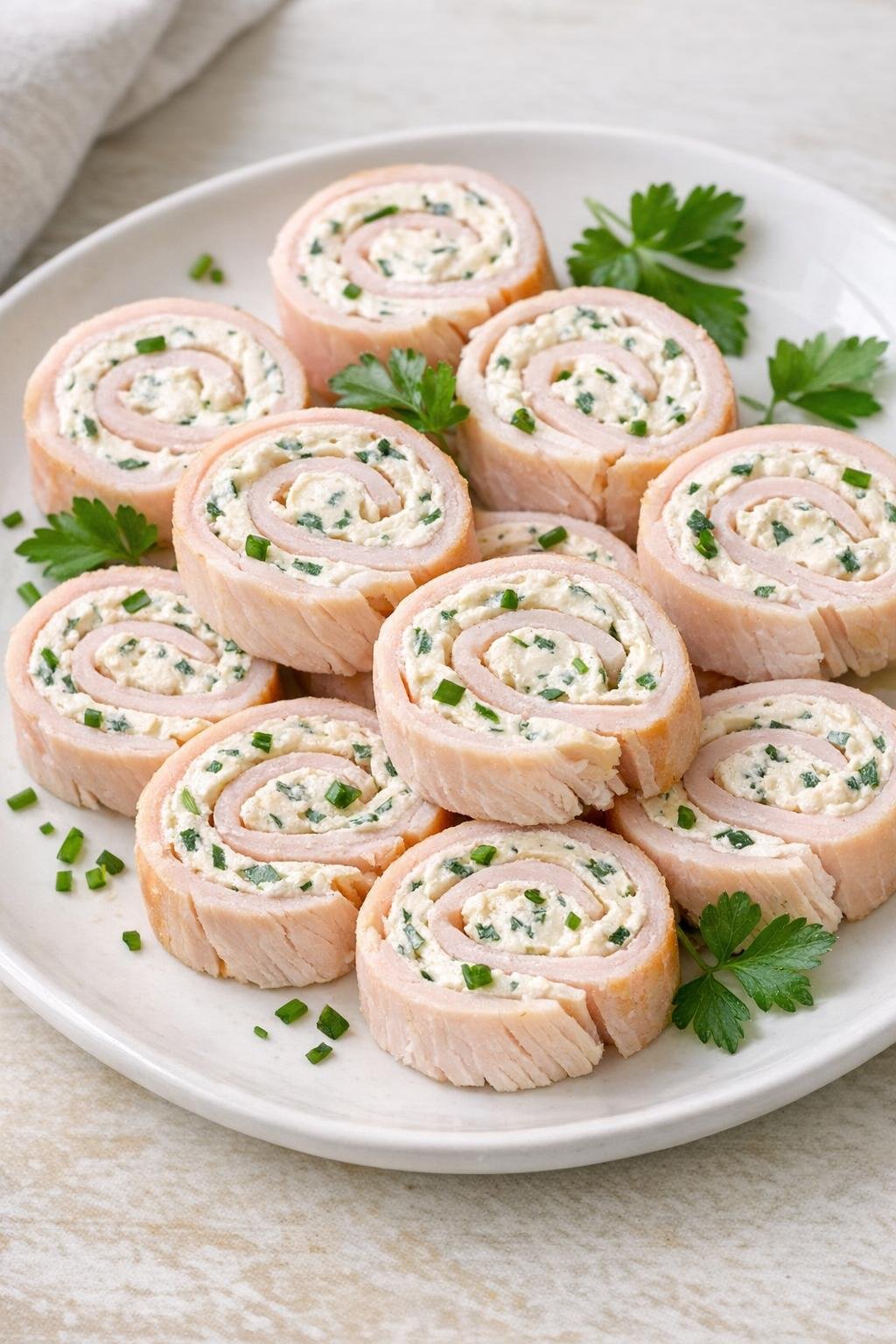 Finished turkey ranch roll-ups on a serving plate