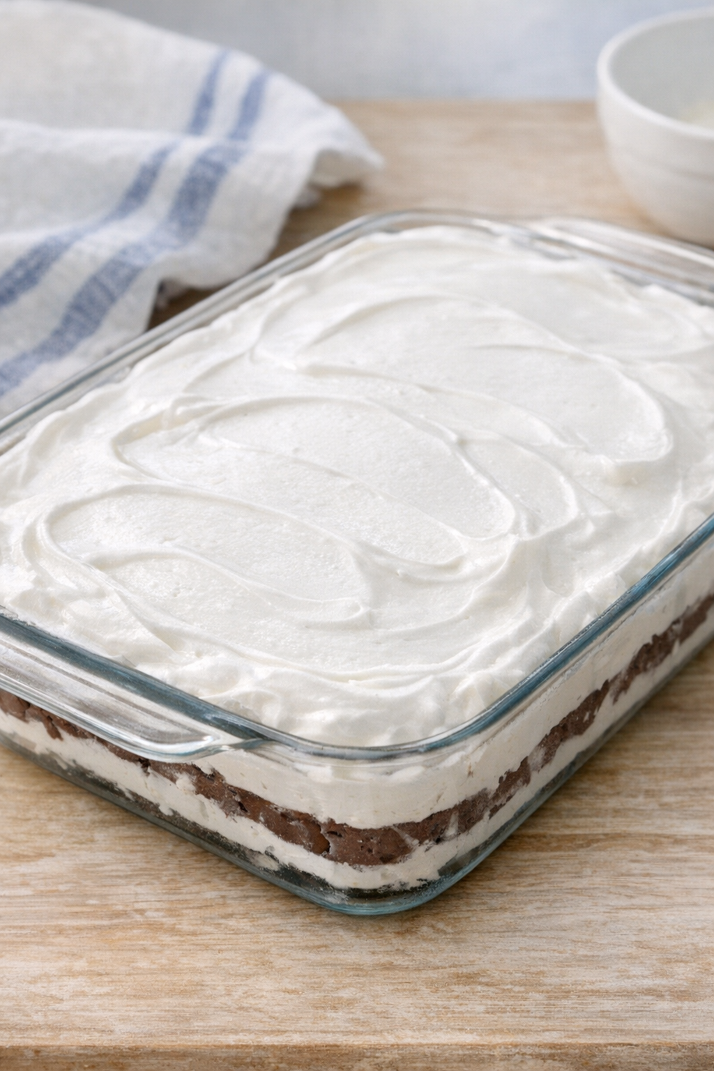 Second layer added and topped with whipped topping