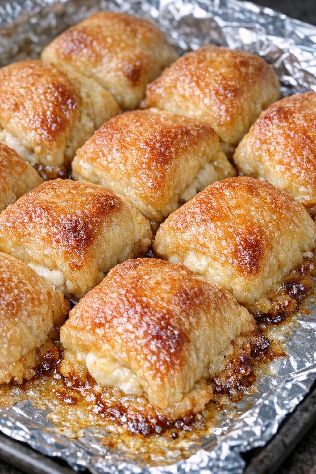 Southern 3-ingredient baked cream cheese bites on a foil-lined baking tray