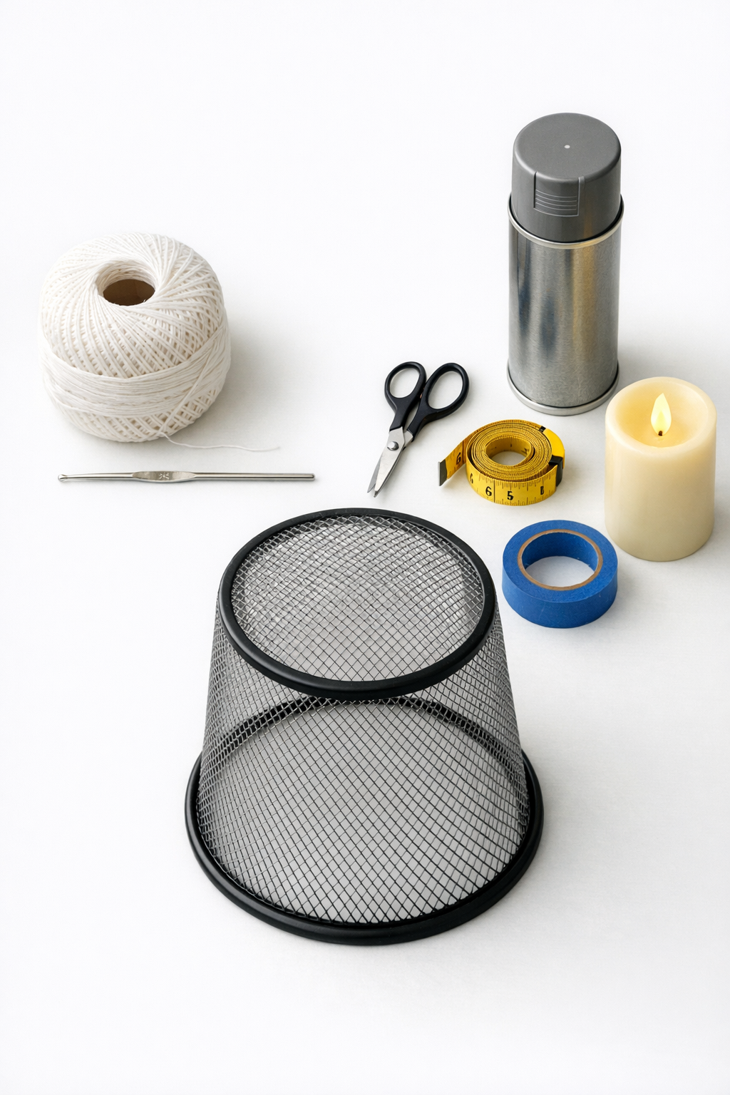 Materials for a crochet lantern cover made with a wire mesh trash can and cotton lace thread