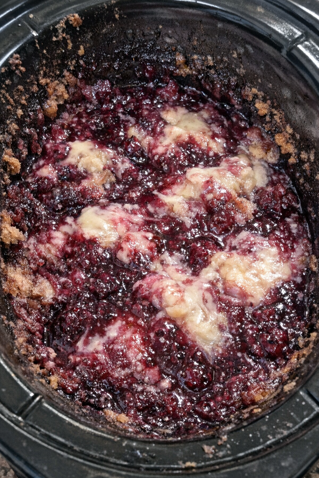 Deep magenta and alabaster dessert bake in a slow cooker
