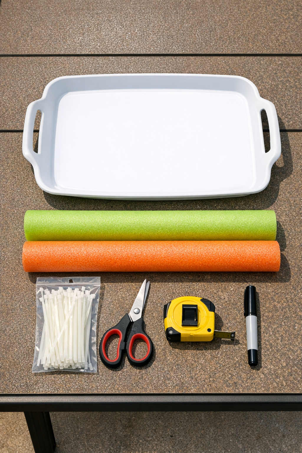 Materials laid out for a floating pool tray project