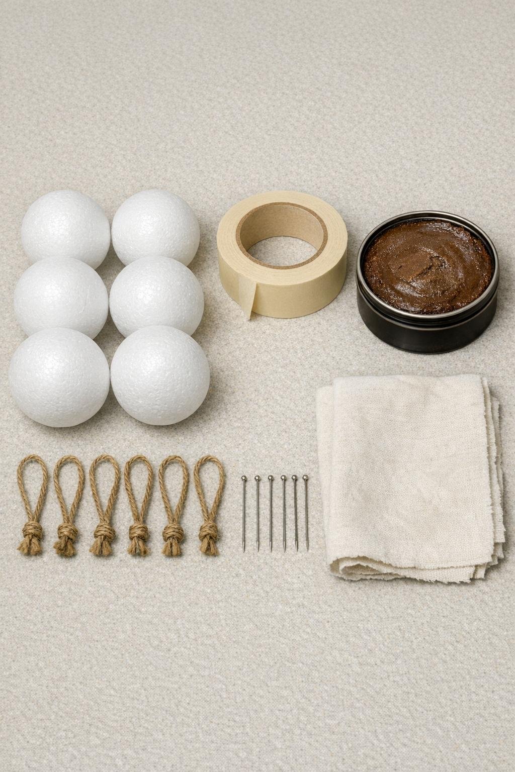 Materials laid out for faux leather ball ornaments