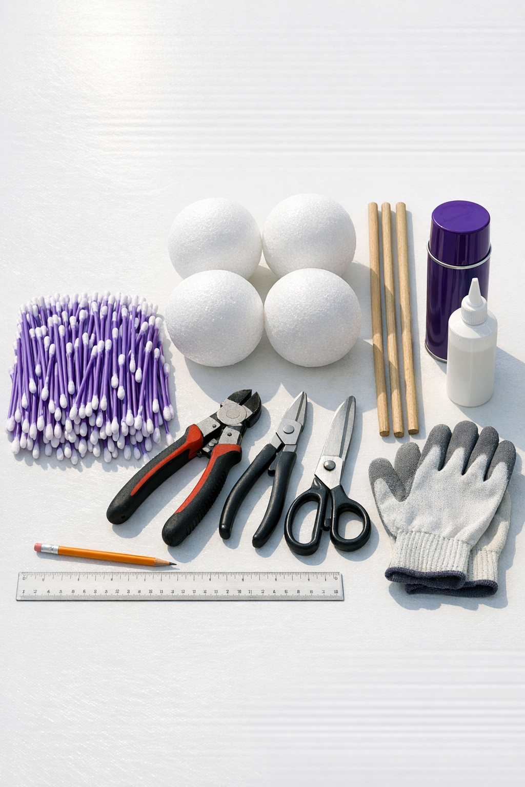 Materials for decorative allium flowers laid out on a work surface