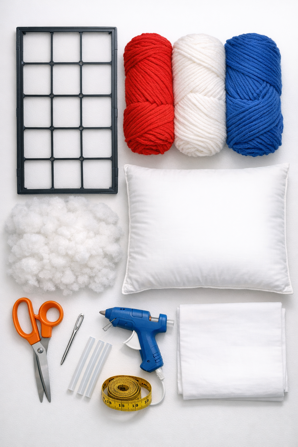 Materials for making a patriotic yarn-woven lumbar pillow laid out neatly