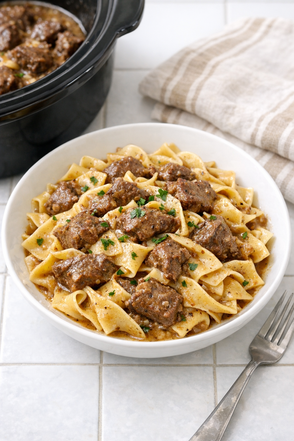 Finished Amish butter beef pasta plated in a bowl