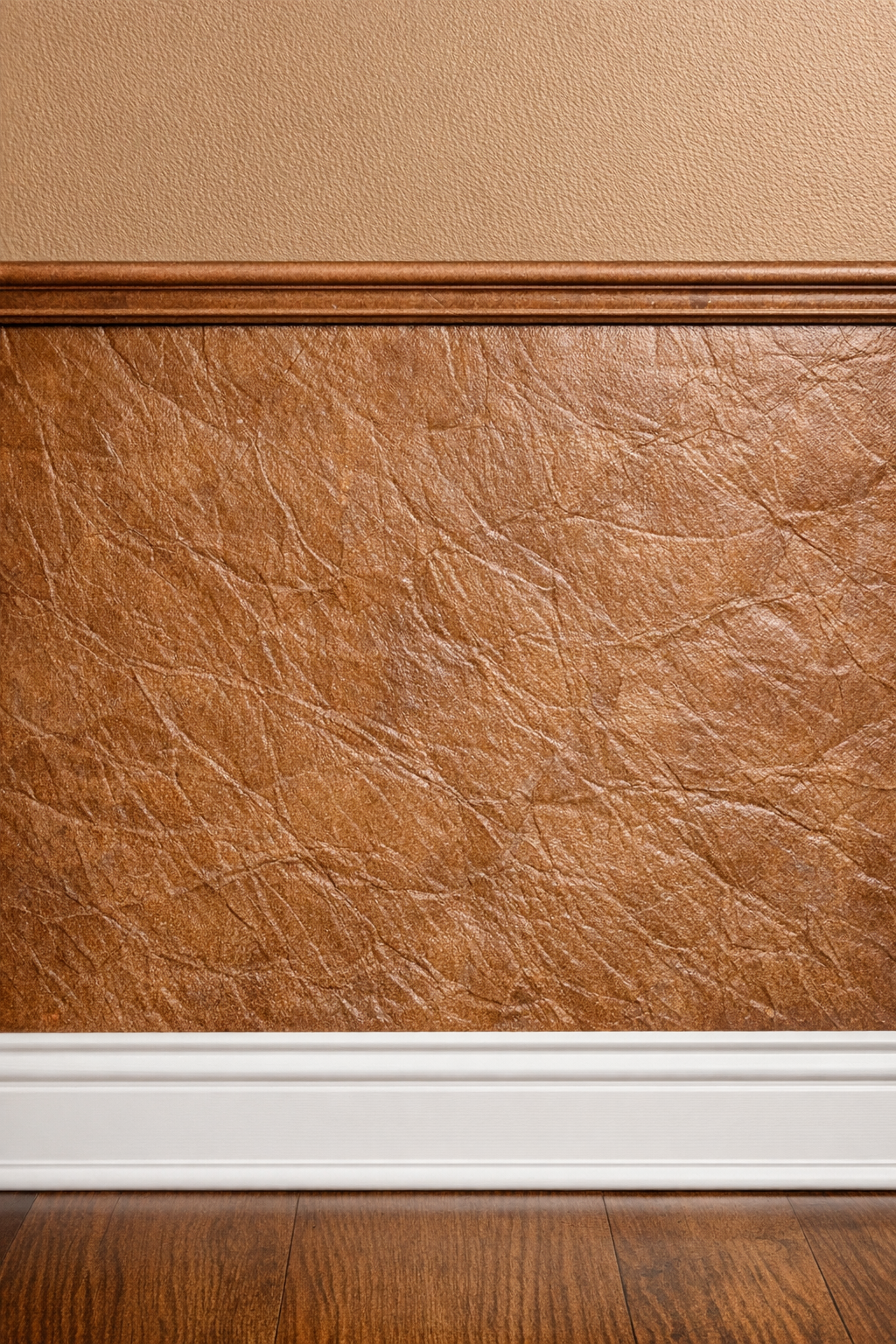 Finished faux leather wainscoting made from brown paper lunch bags on a wall