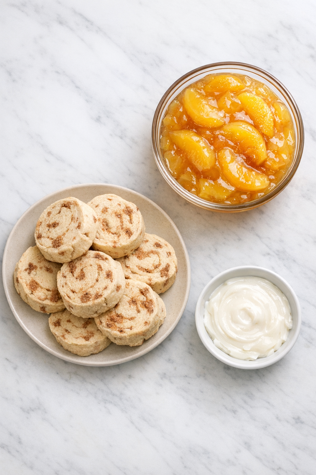 Cinnamon roll dough, peach pie filling, and icing