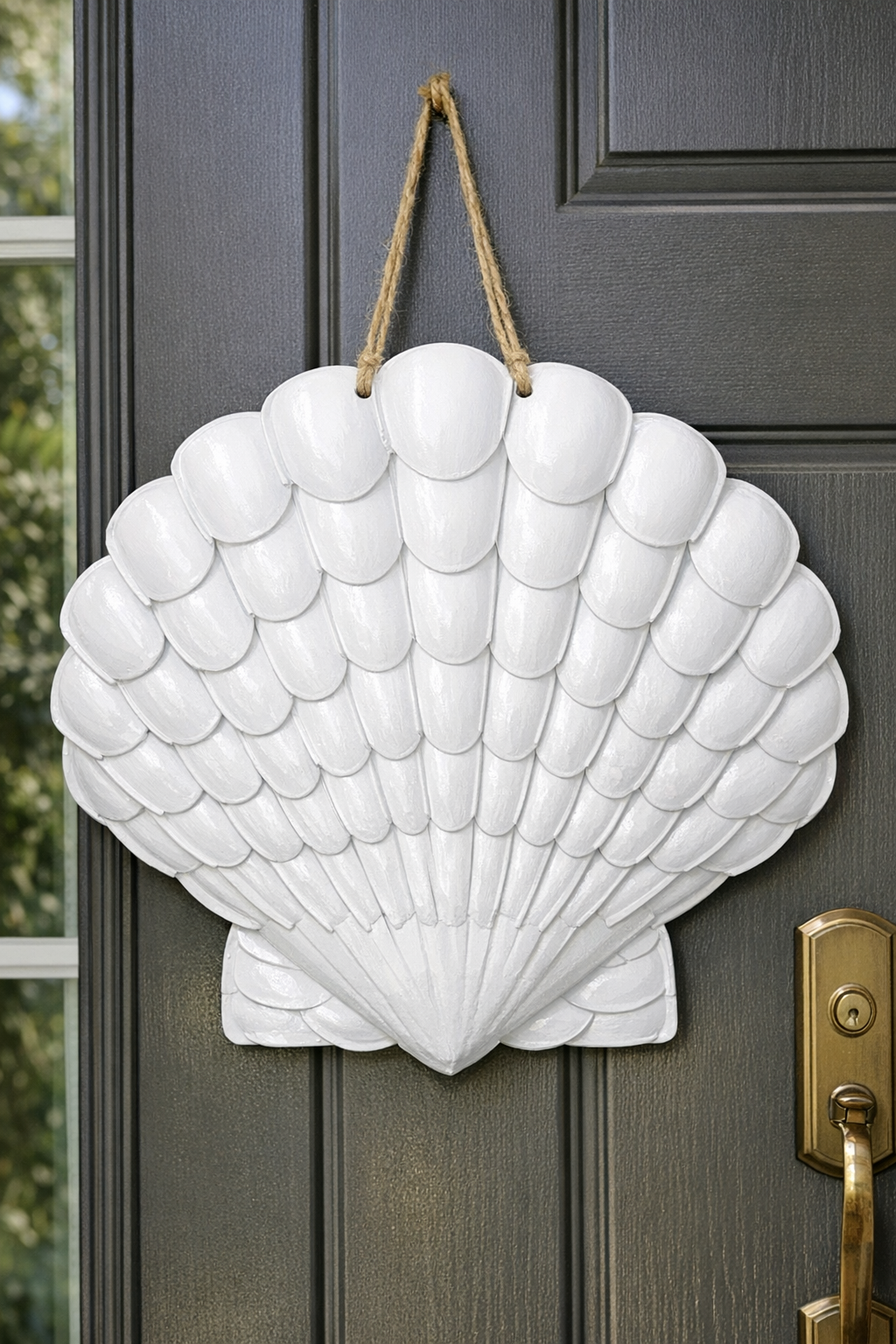 Finished giant coastal seashell front door hanger made from spoons and a dustpan