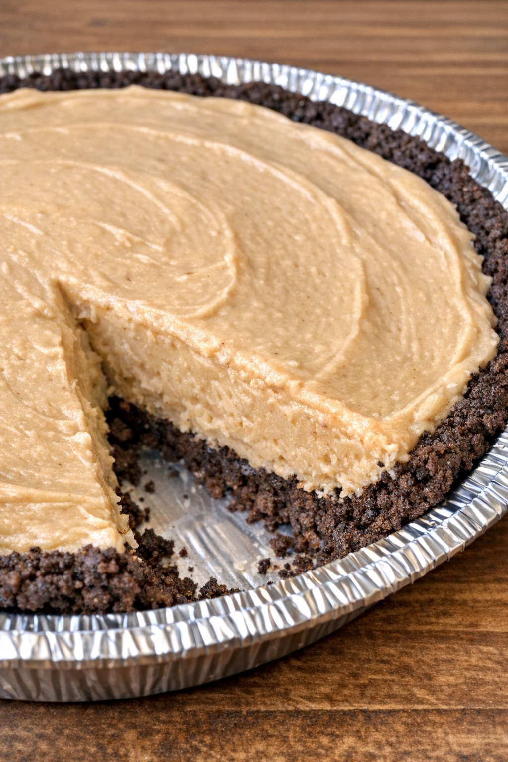 Close-up of 3-ingredient peanut butter pie in a foil pie tin