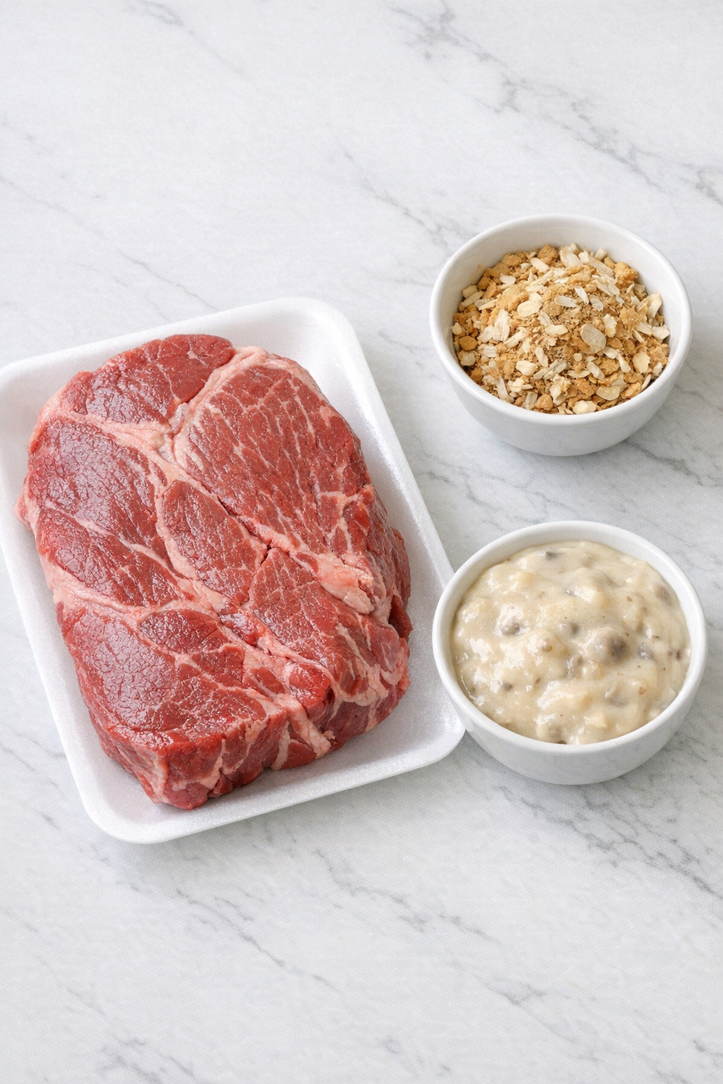 Beef roast, onion soup mix, and mushroom soup ingredients