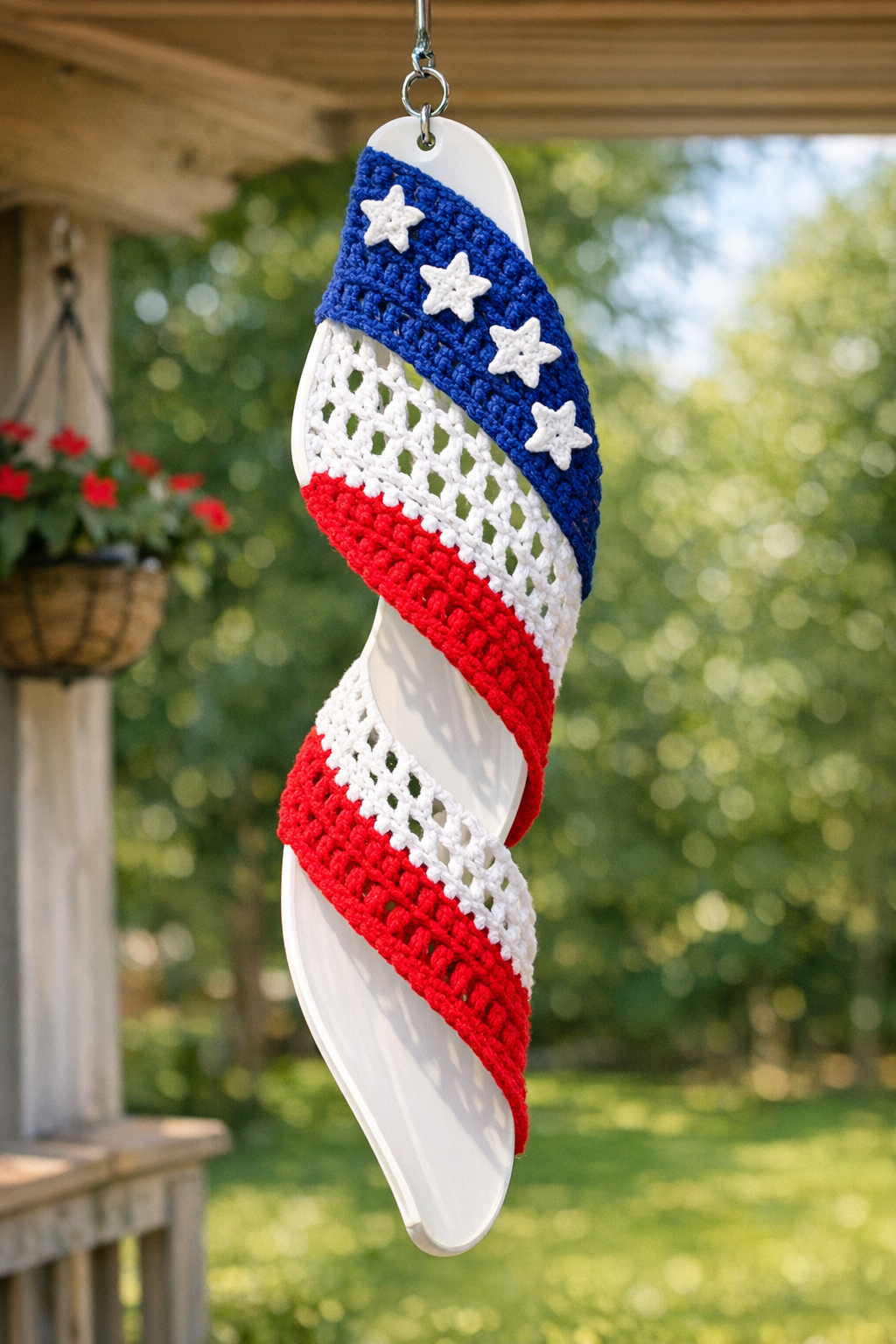 Finished patriotic crochet wind spinner hanging outdoors