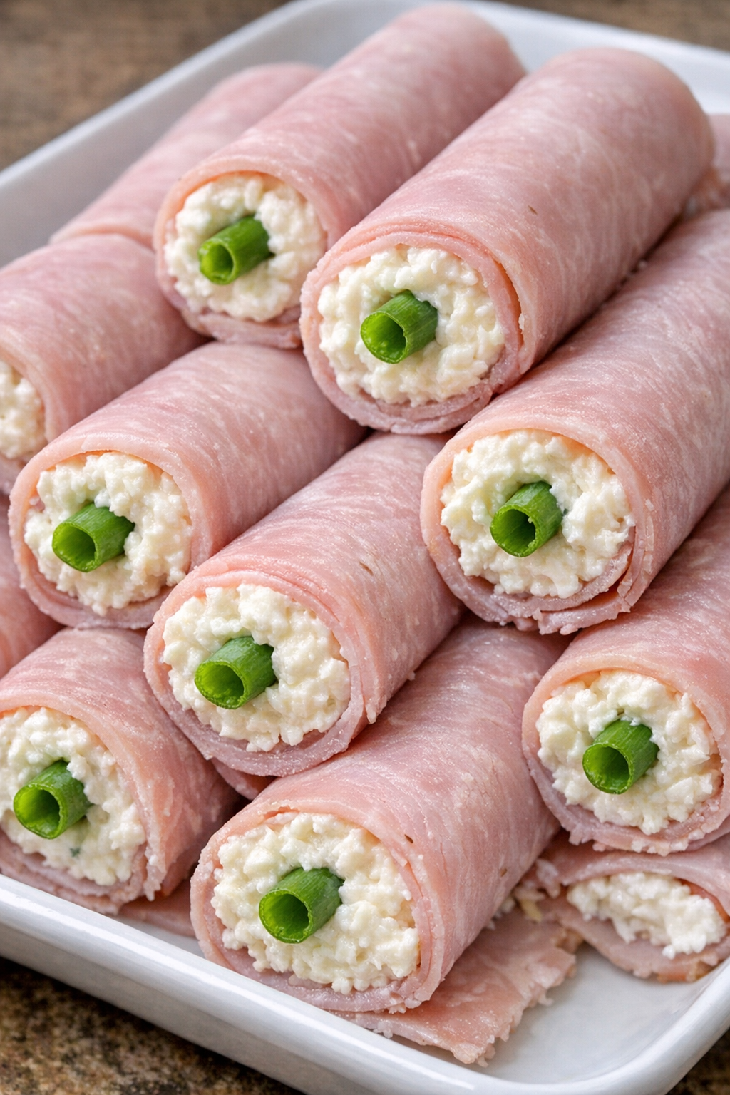 Finished southern ham roll ups on a potluck tray
