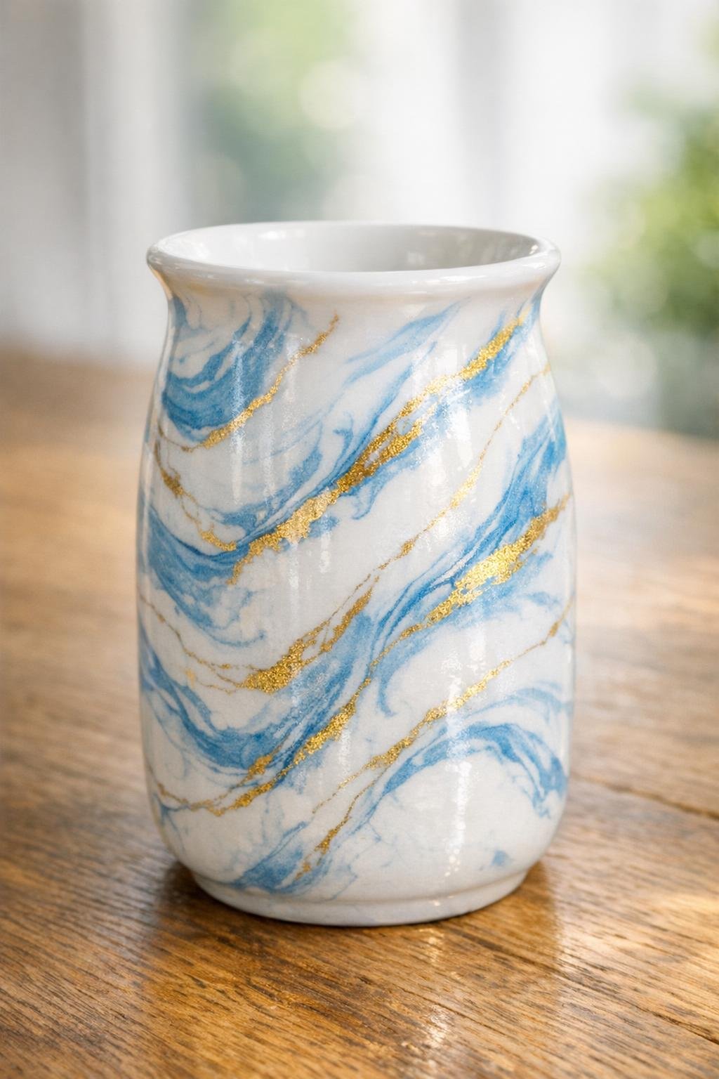Finished white vase with blue and gold marbled porcelain-look finish