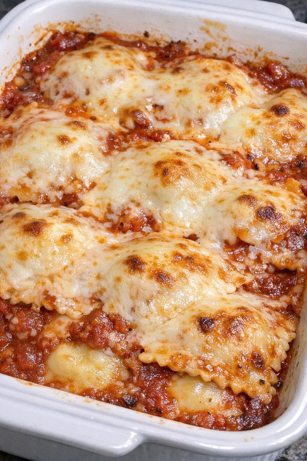4-ingredient ravioli lasagna in a white casserole dish