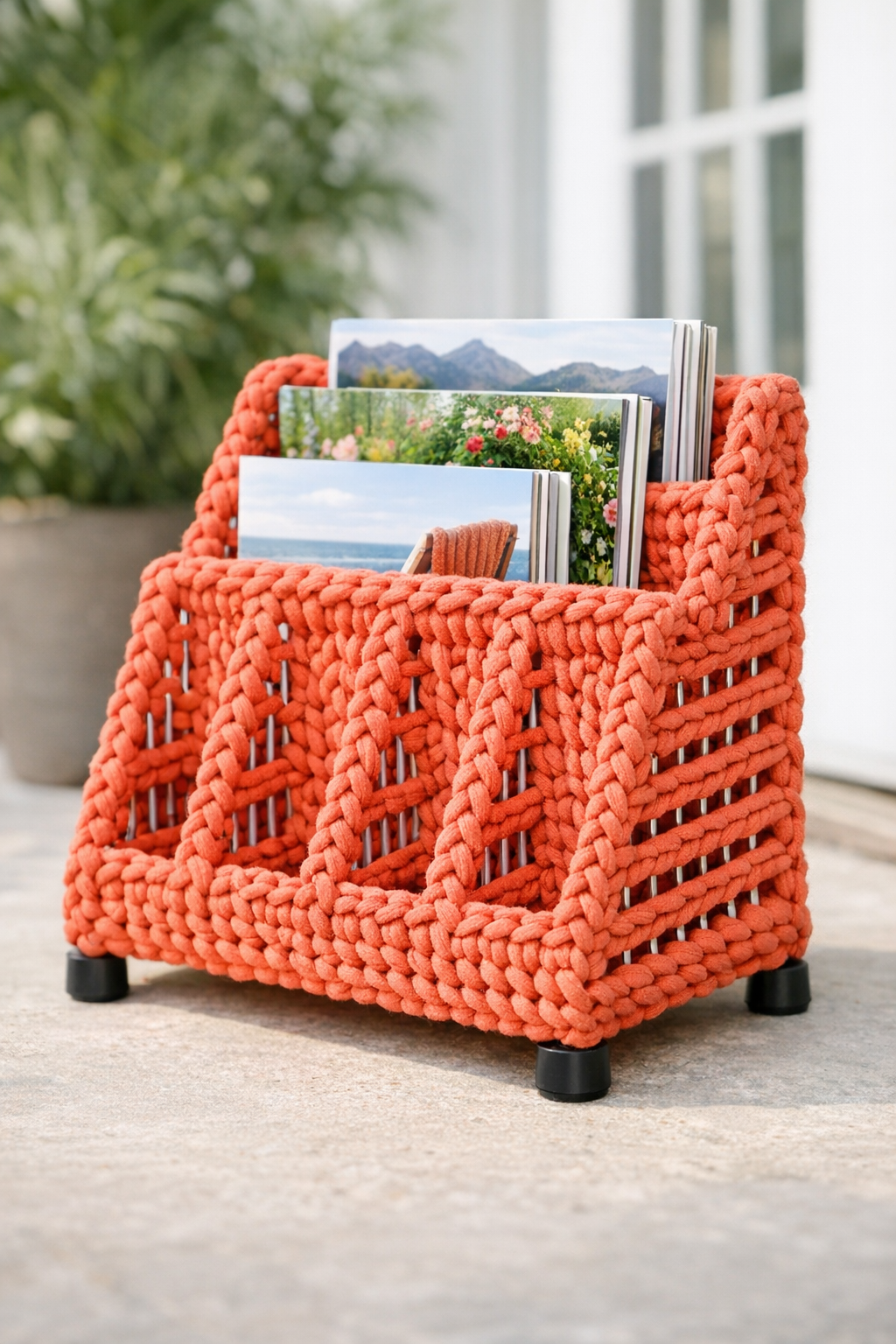 Finished crocheted outdoor magazine rack made from a dish rack