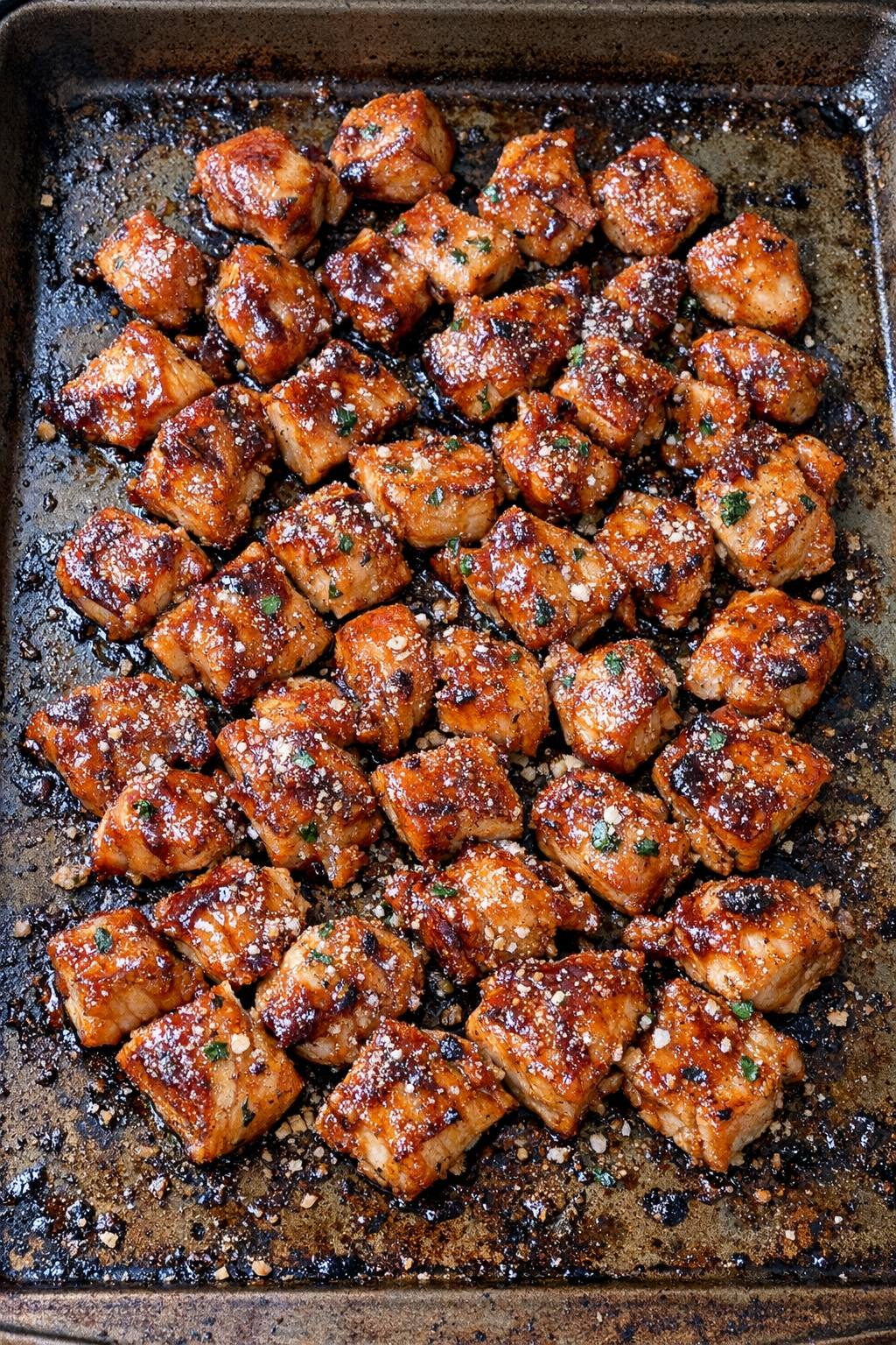 Finished baked barbecue ranch chicken on a sheet pan