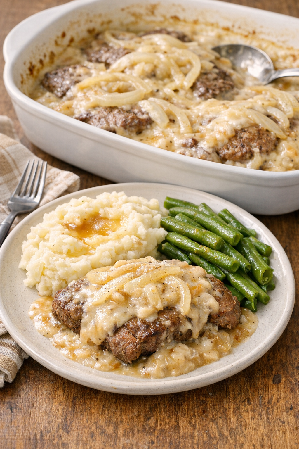 Finished Amish beef and cream of potato bake plated with creamy sauce