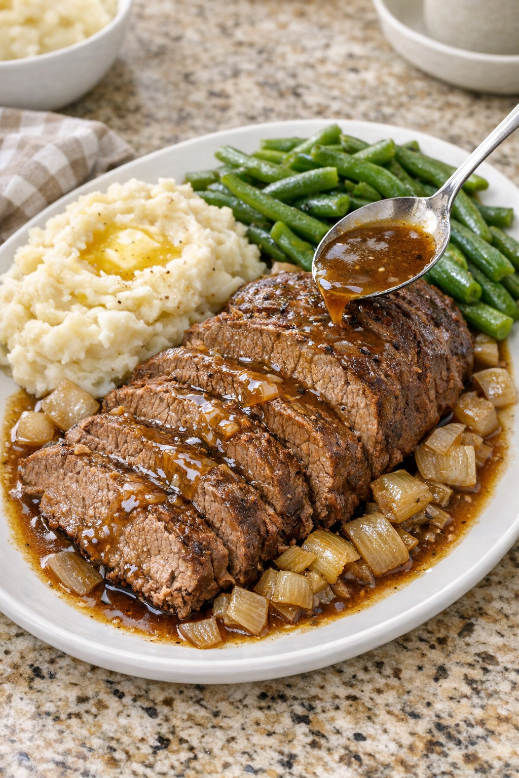 Finished Amish bay leaf beef roast sliced on a platter