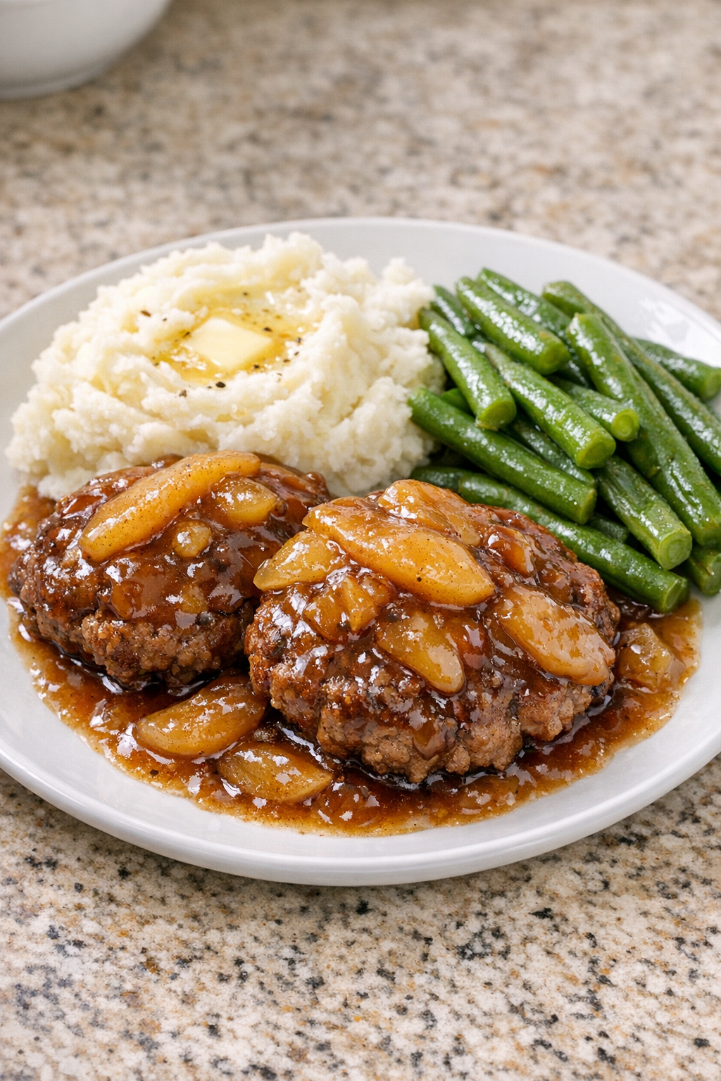 Finished slow cooker beef with apple glaze on a serving plate