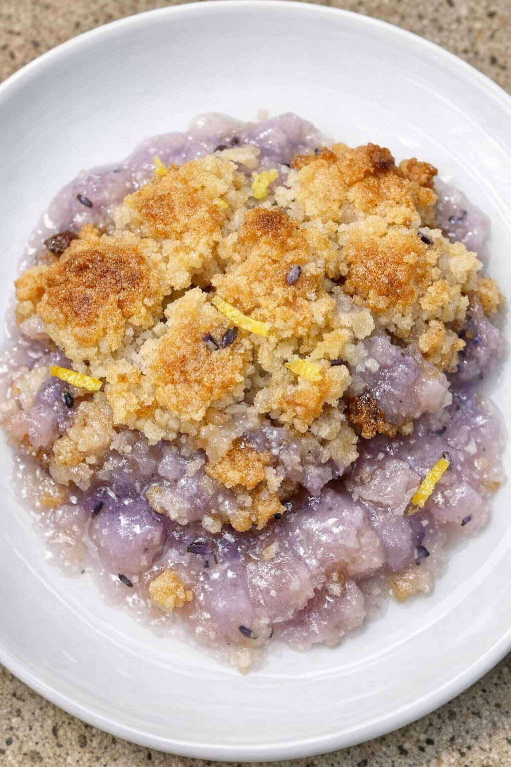 Slow cooker lavender lemonade cobbler served on a white plate