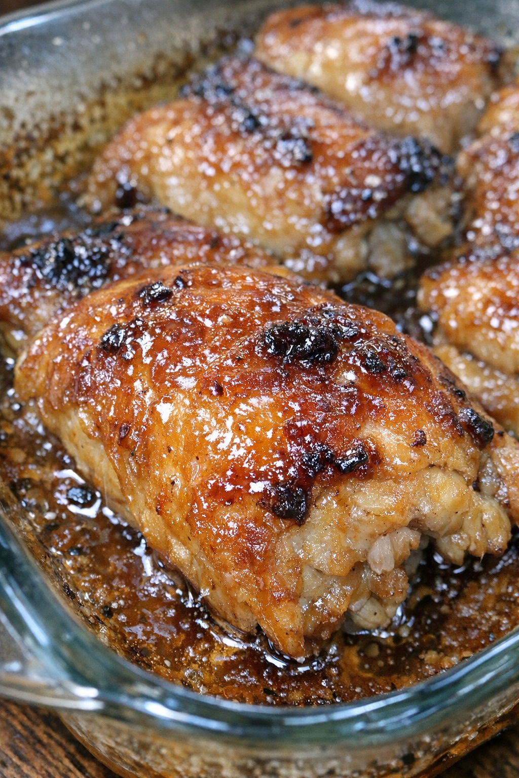 Roasted glazed protein in a glass baking dish