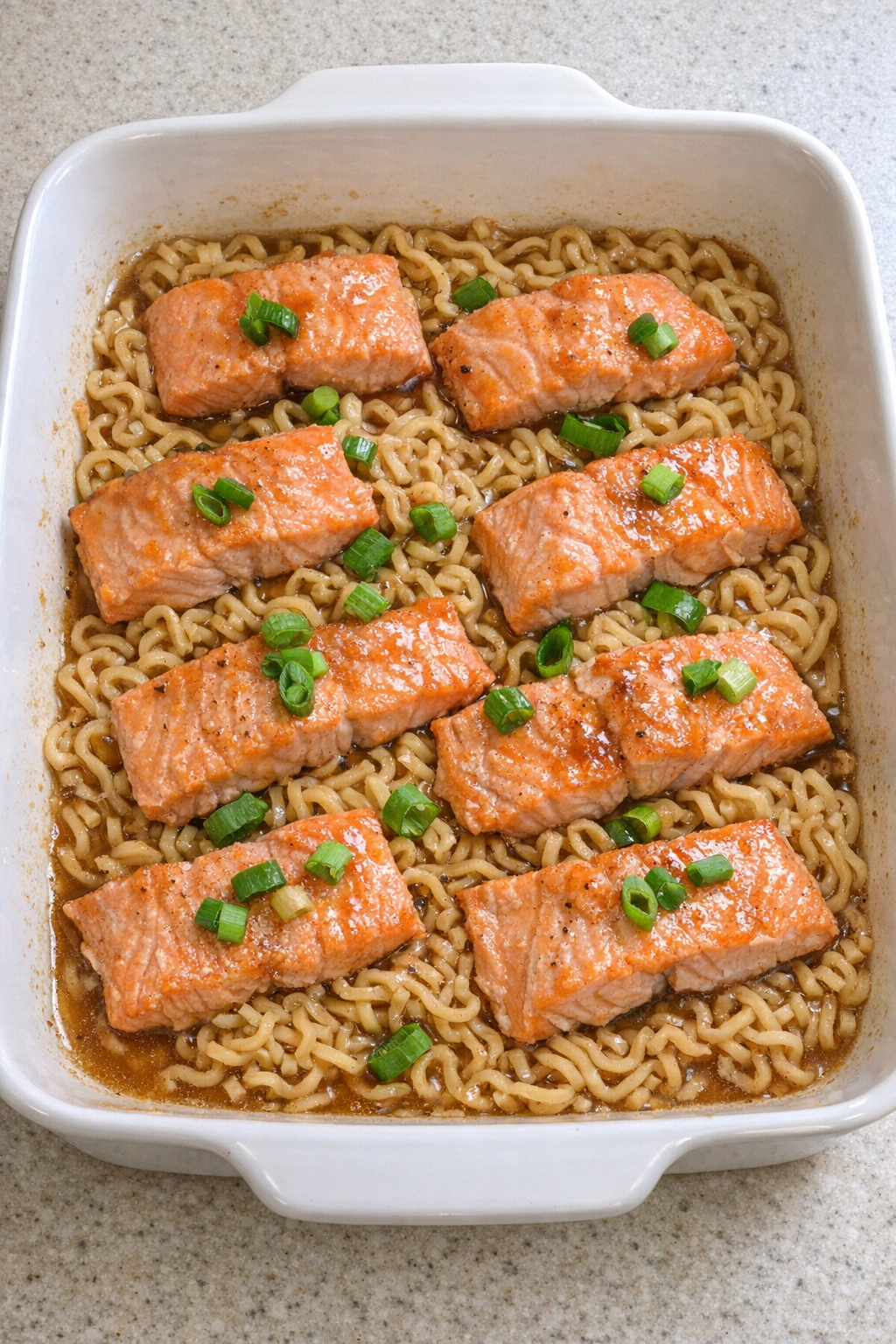 Finished baked salmon ramen in a casserole dish
