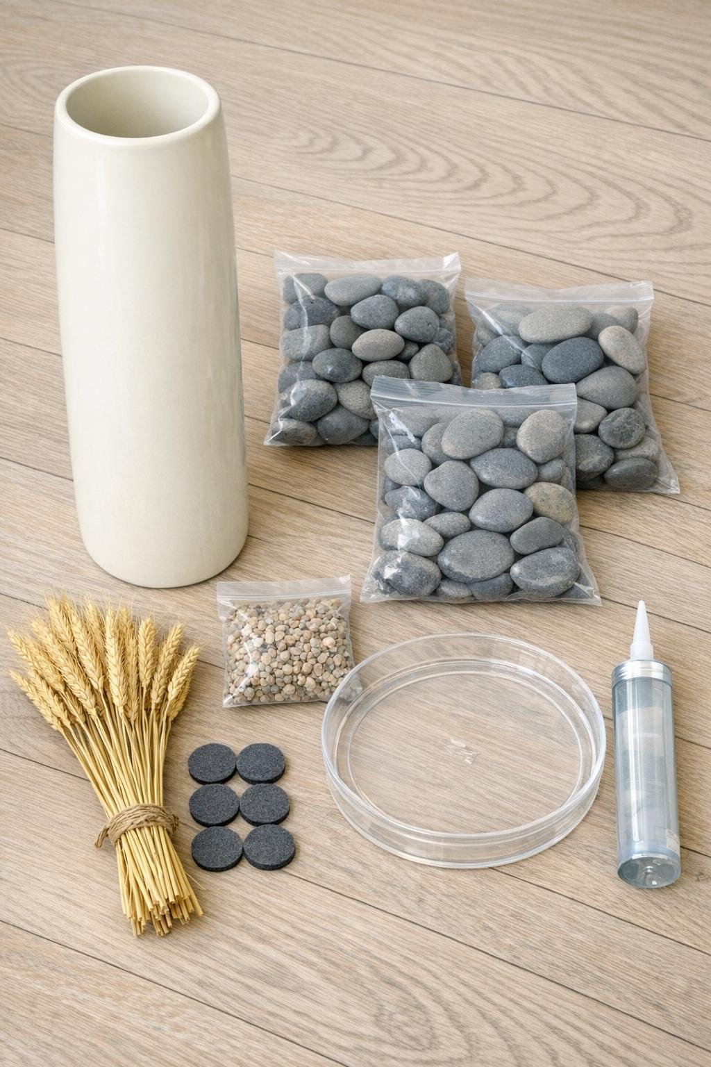 Materials for a ceramic vase umbrella stand laid out together