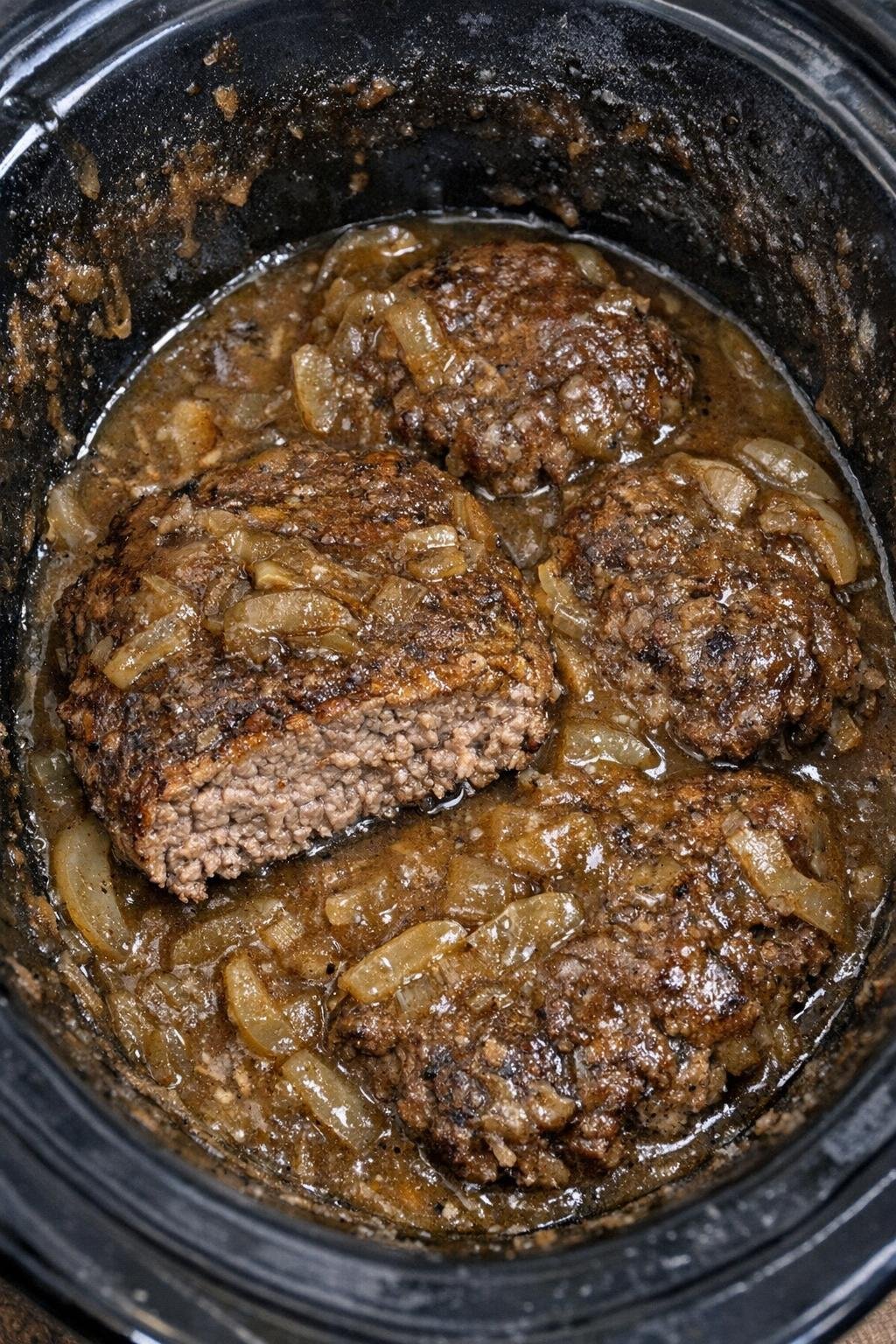 Tender cube steak in onion gravy in a slow cooker