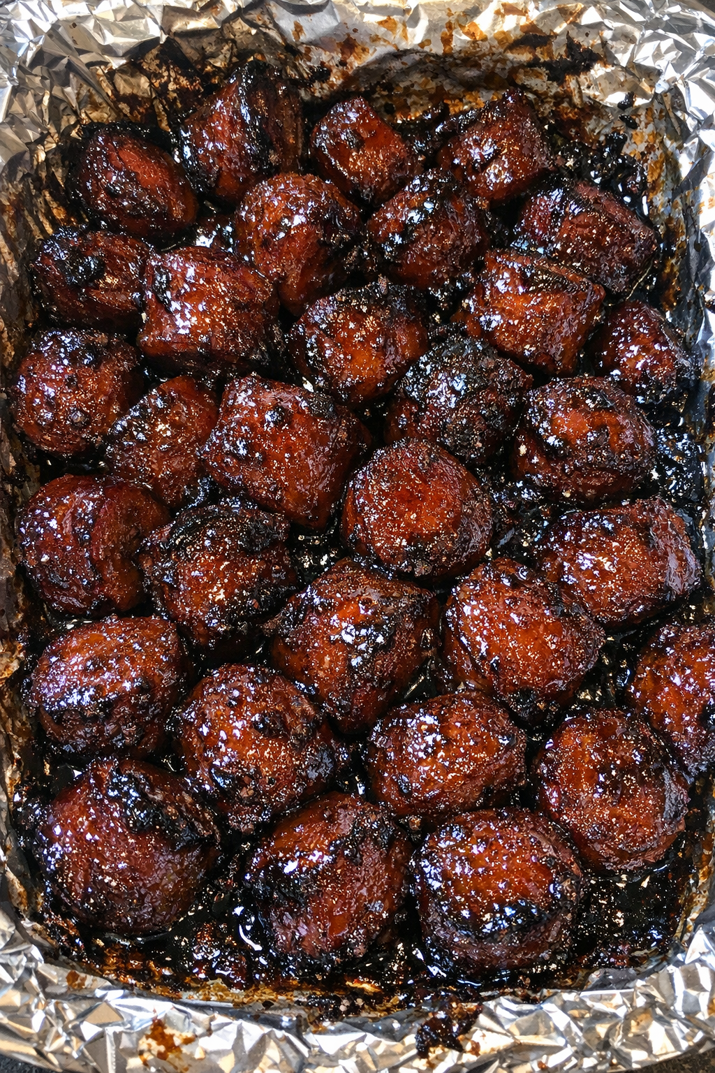 3-ingredient hot dog burnt ends in a foil-lined platter