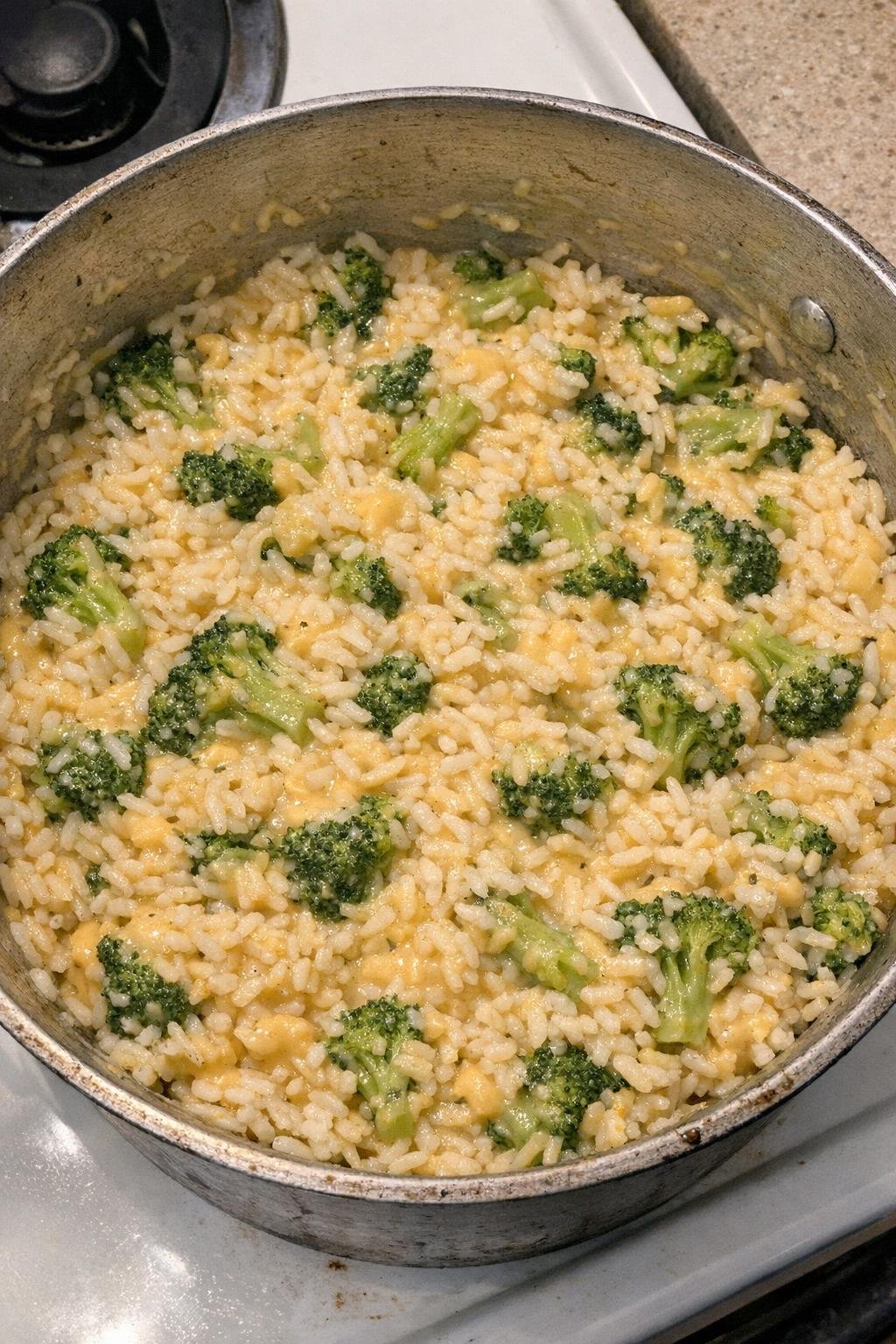 Finished broccoli rice casserole in a rustic pot