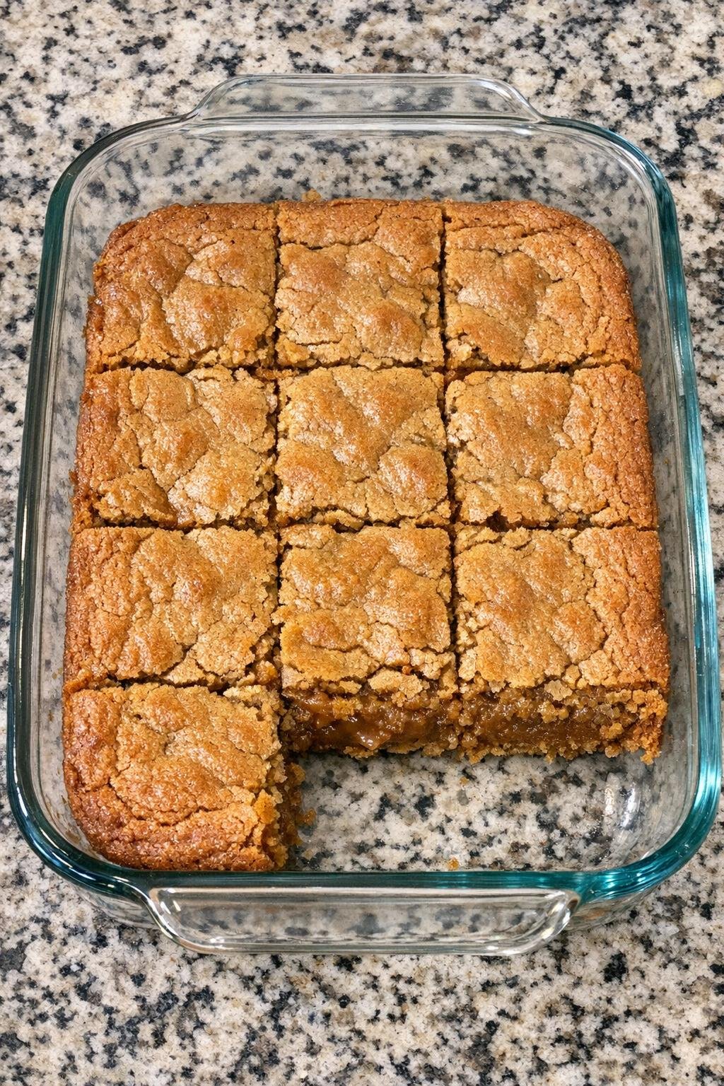 3-ingredient peanut butter blondies in a glass casserole dish