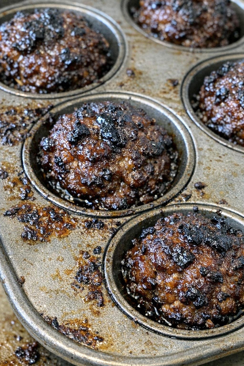 Caramelized beef bites in a muffin pan