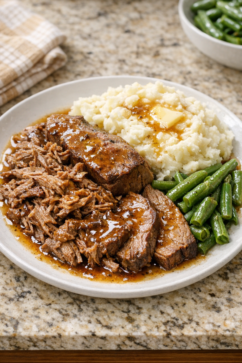 Finished Amish buttermilk beef plated with juices