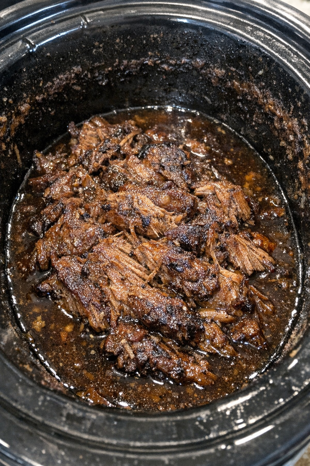 Slow cooker caramelized savory protein in sauce