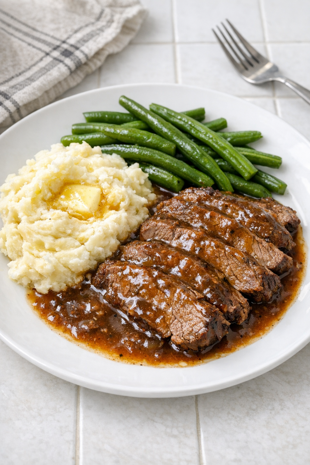 Finished Amish beer beef plated with gravy